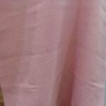 Pink Nylon CEY fabric draped to show its crinkled texture