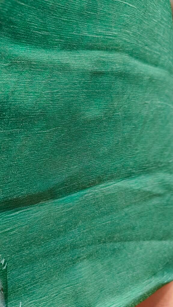 Close-up of green Nylon CEY fabric texture
